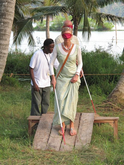 Several visitors tried out the obstacle course blindfolded with a cane