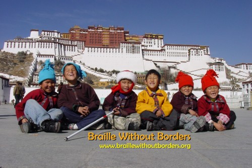 students in front of Potala palace